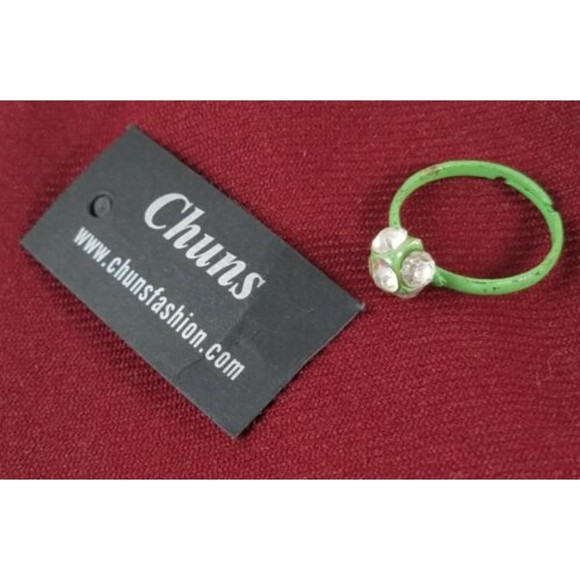 NWT! Womens Chuns Fashions Ring Green Band Clear Stones One Size Bling Jewelry - Picture 1 of 6